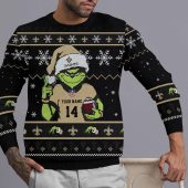 New Orleans Saints Grinch Christmas Touchdown Ugly Christmas Sweater Front - TeeUgly